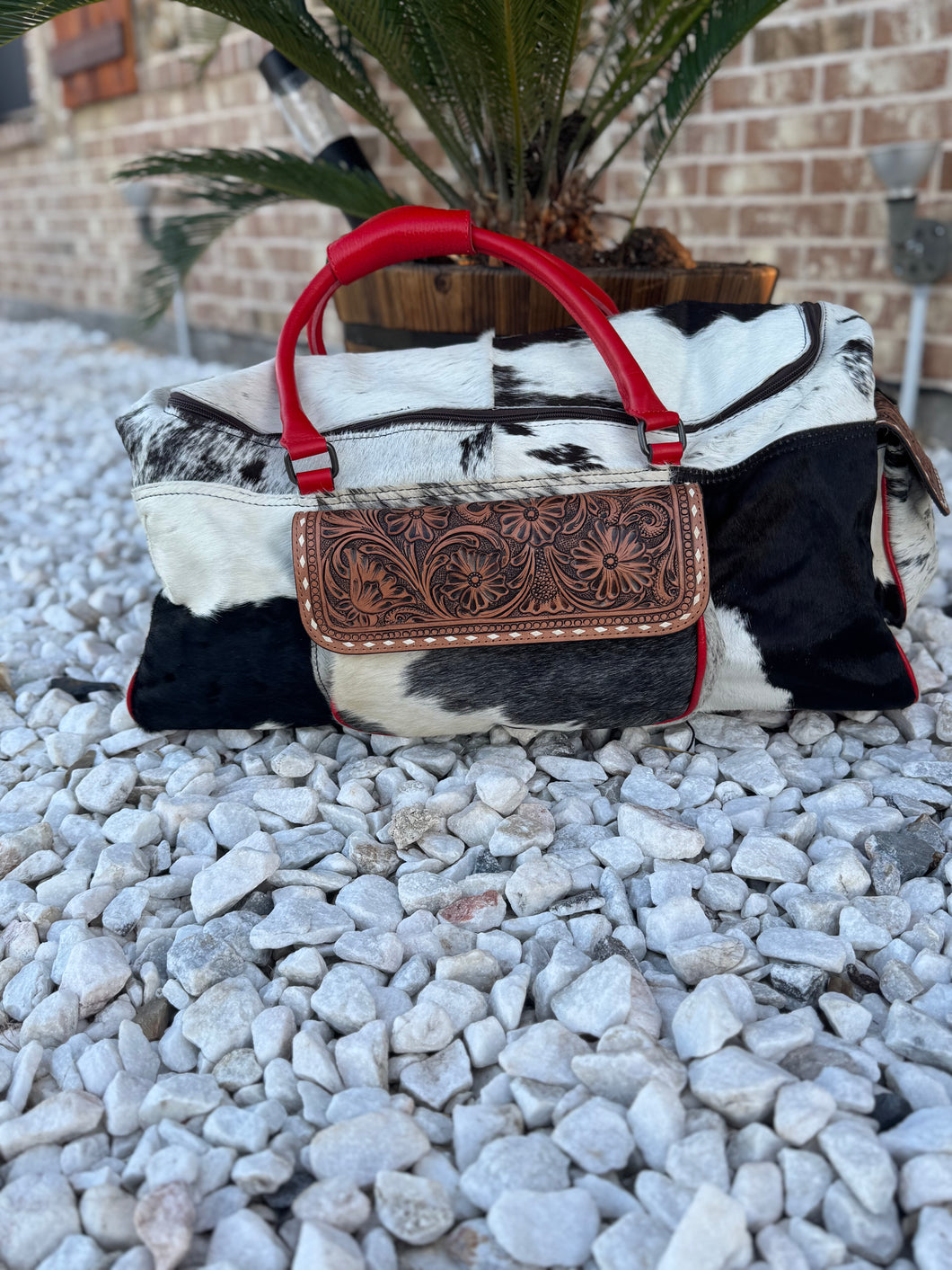 Cowhide tooled leather duffle bag