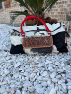 Cowhide tooled leather duffle bag
